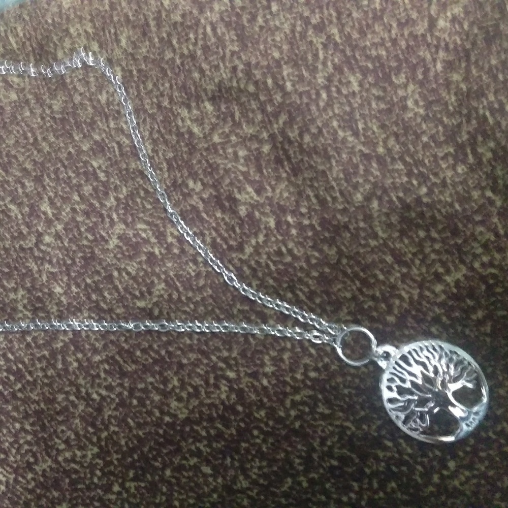 Long tree of life necklace.